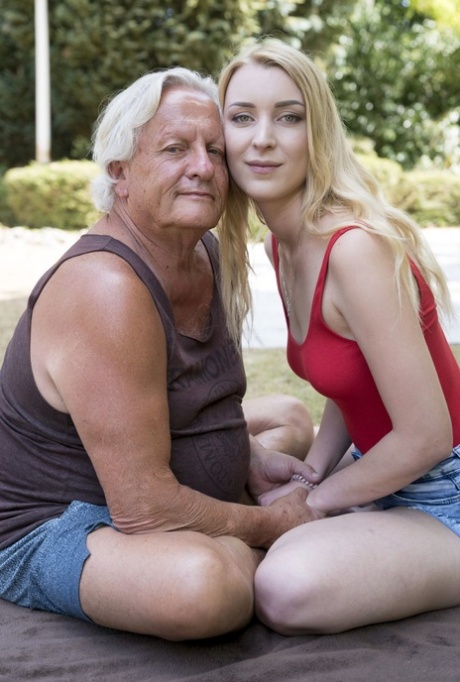 Blonde Amaris dressed in a bodysuit seduce and sexually assault an elderly yogi outside.