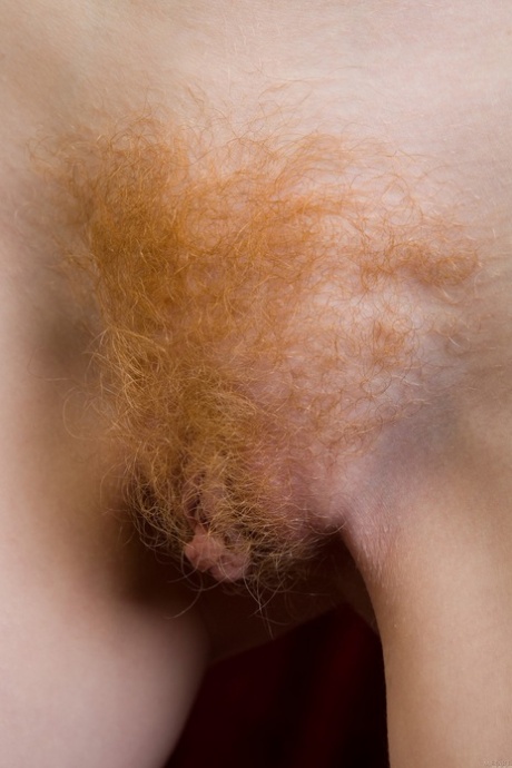 Curly-haired Ginger Rochelle A Strips Naked & Showcases Her Furry Snatch