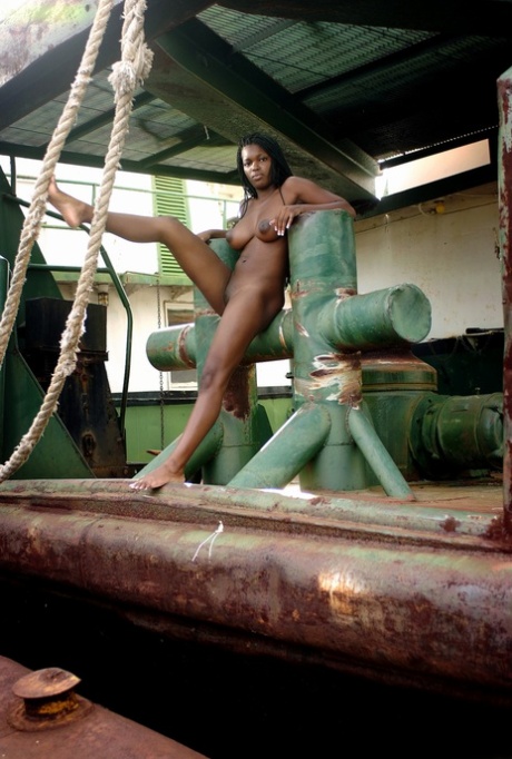 Busty Ebony Teen Deserea A Posing Butt Naked On A Huge Old Boat