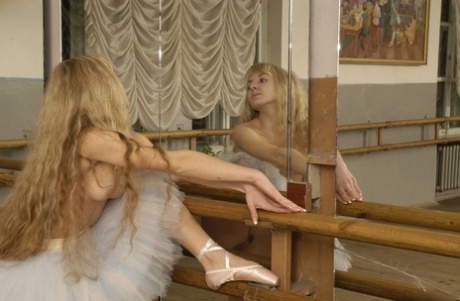 Topless ballerina Alla B shows off her small tits and big asses.