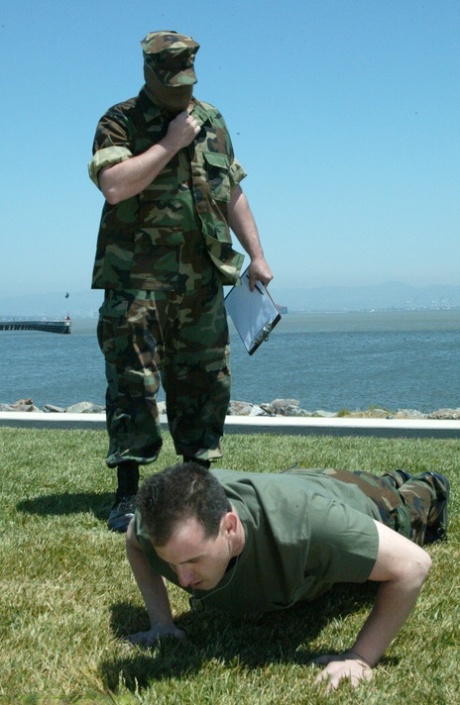 A soldier is disciplined by Mika Tan, an Asian general, who grabs his dick with discipline.