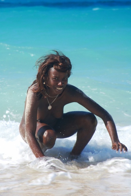Exotic Ebony Babe Maria L Showcases Her Great Naked Body On A Sandy Beach