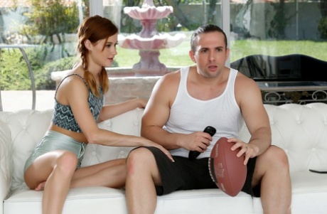 On Sunday football game, Alainha Dawson (an attractive redhead) engages in sexual activity with her boyfriend.