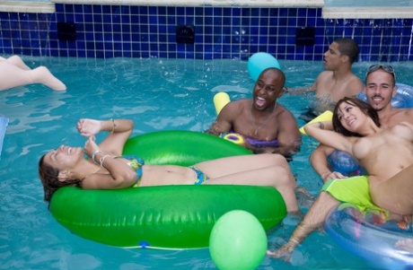 Hell-raisers: These erotic pornstars are having a blast at an ornate pool party.