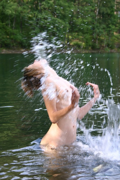 Slender Russian Teen Zarina Peels Her Bikini Off And Takes A Bath In The River
