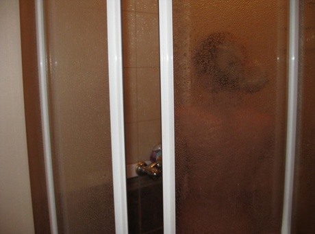 Amateur teen Christy washing her sweet naked body & natural tits in the shower