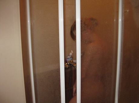 Amateur teen Christy washing her sweet naked body & natural tits in the shower