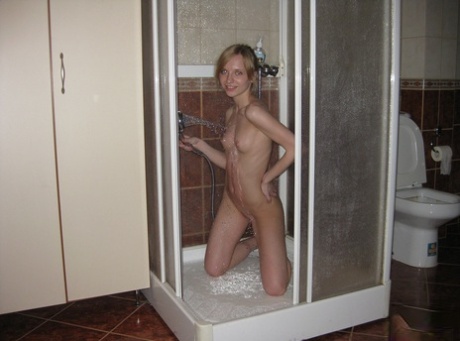 Amateur teen Christy washing her sweet naked body & natural tits in the shower