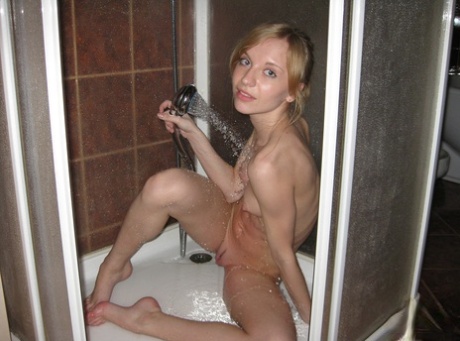 Amateur teen Christy washing her sweet naked body & natural tits in the shower