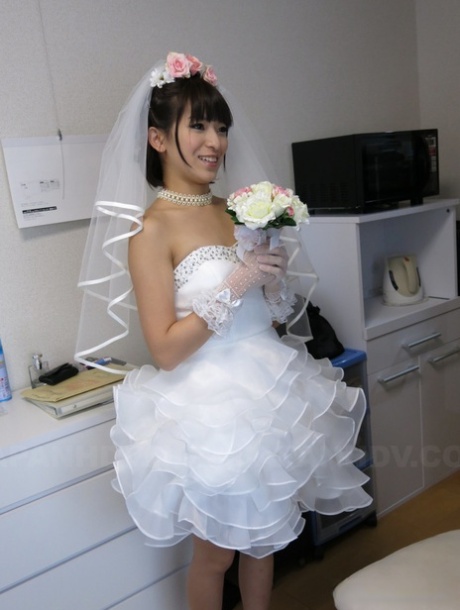 Japanese bride Ruri Narumiya fucks on the floor after tasting a wedding cake