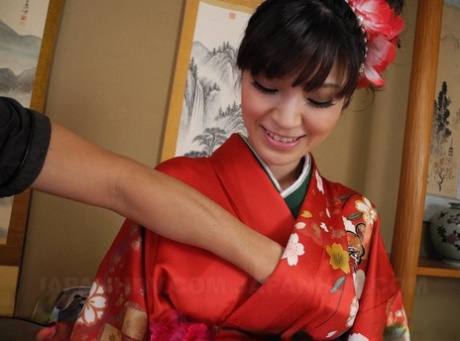 The Japanese wife Yuria Tominaga shows off her natural breasts and enjoys cuddling her bush.