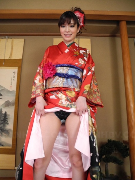 Yuria Tominaga, the wife of Japan, exposes her natural breasts and enjoys biting them.