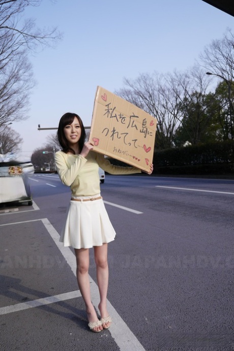 A car carries Shiori Yamate, an Asian lady, who displays her radiant breasts and gives a blowjob while indulging in some oral sex.