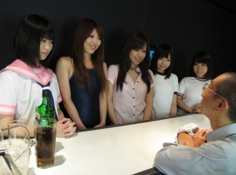 Cute Japanese teens participate in a wild Asian orgy in the nightclub