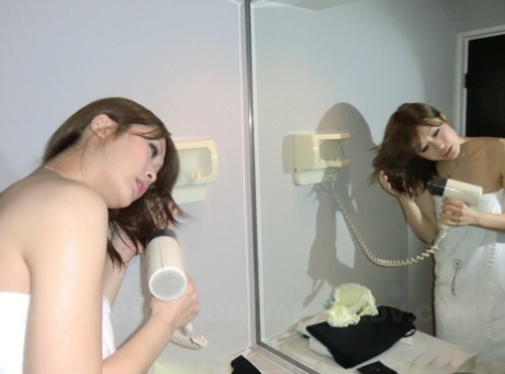 During client satisfaction checks, Akina performs oral ejaculation on their small member before showering.