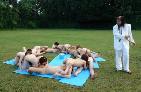 As part of an outdoor XL2 tradition, Japanese young women participate in intimate games with their partners.