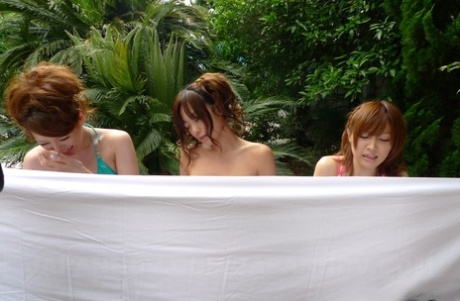 Japanese cute babies in bikinis get their twats fingered outside.