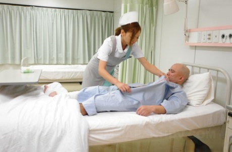 A horny elderly patient is given oral sex by Japanese nurse Mio Kuraki.