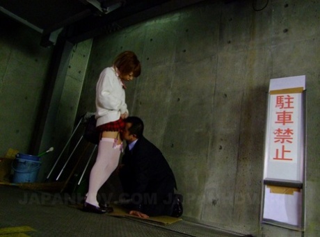 The parking garage stairwell sees an Asian girl named Rui Hazuki sucking a stranger's penis.