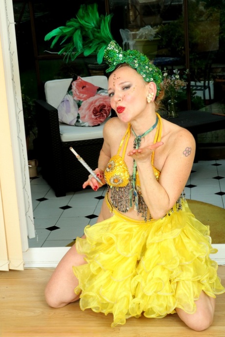 Attractive non-professional MiLF Mouse loses her seductive outfit and toy sets for its large phallus.
