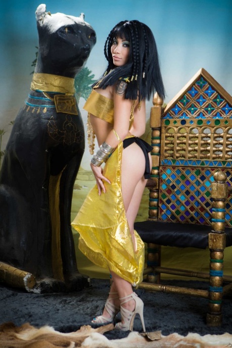 The boobs and buttocks of Cleopatra are showcased by Rina Ellis, the petite Asian beauty.
