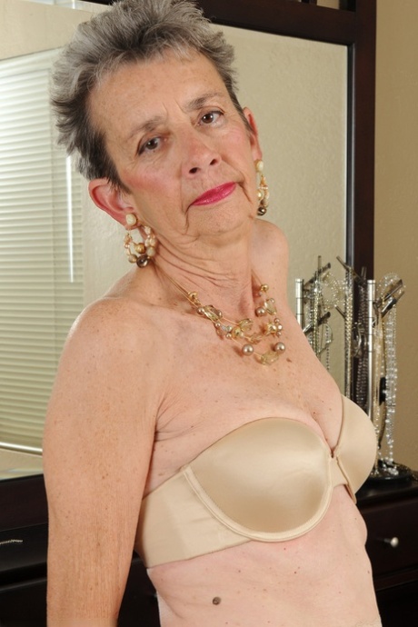 Slim Granny Cassie Doffs Her Dress And Flaunts Her Bushy Vagina