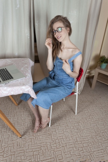 Amateur Girl In Glasses Yunona Reveals Her Hairy Pussy And Poses On A Chair