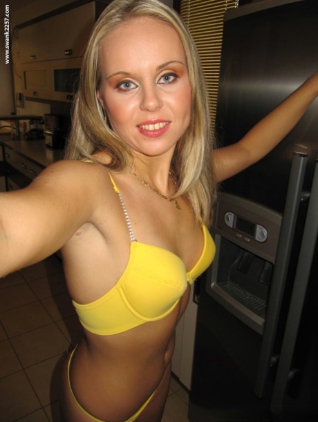 A solo performance by blonde Candra Smith showcases her tiny breast and bared, clean-shaven cutice.