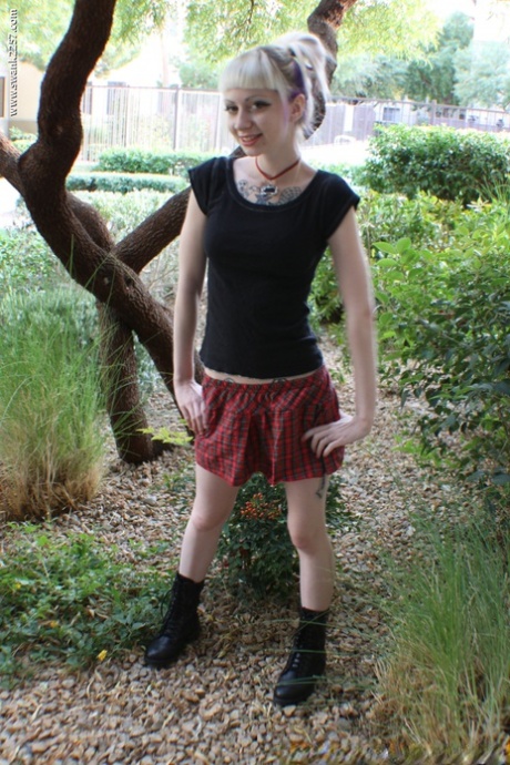 Blonde Teen With Tattoos Symone Poses In A Plaid Skirt Outdoors
