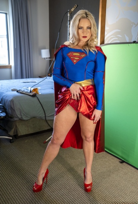 Blonde Supergirl Lisey Sweet Exposes Her Yummy Ass And Hot Tits In A Solo