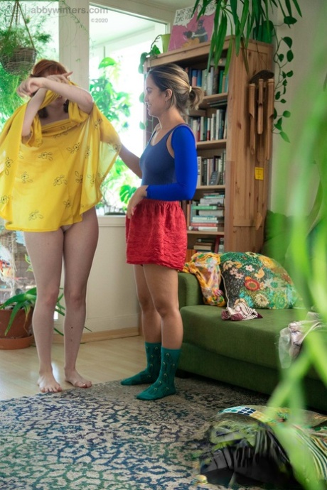 MILF Luciana and Maddie, who are both lesbians, show their tits while dressing up.