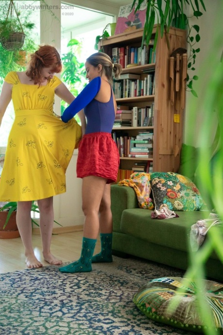MILF Luciana and Maddie, both women, expose their tits while dressing up.
