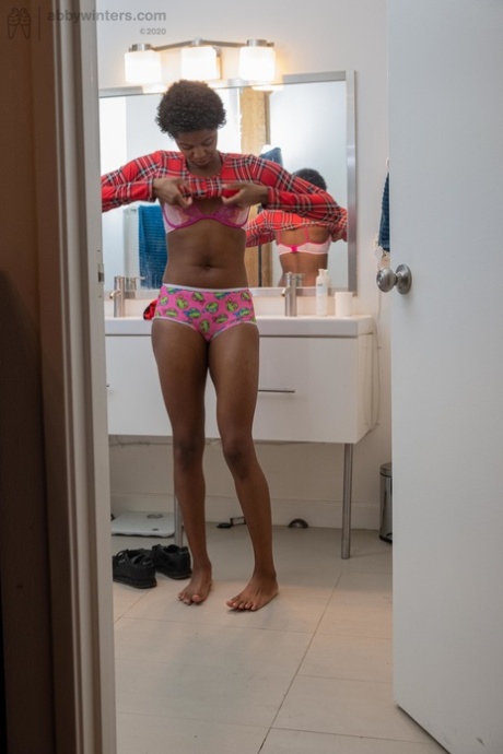 Skinny ebony with short hair Ashlee L dresses in undies & shorts in the toilet