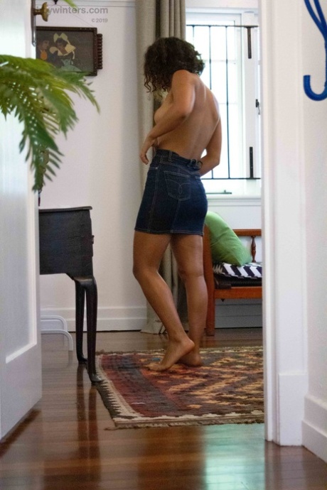 Skinny amateur teen Tilly B dresses in denim shorts and a white shirt