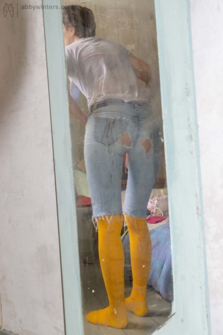 A yellow booted and tight fitting pair of jeans is the outfit of choice for Australian amateur Nikolina, who wears an array of pairs.