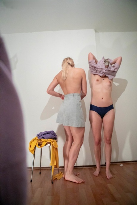 Elin and Maely flaunt their curves and give a French kiss as they do while wearing their clothes.