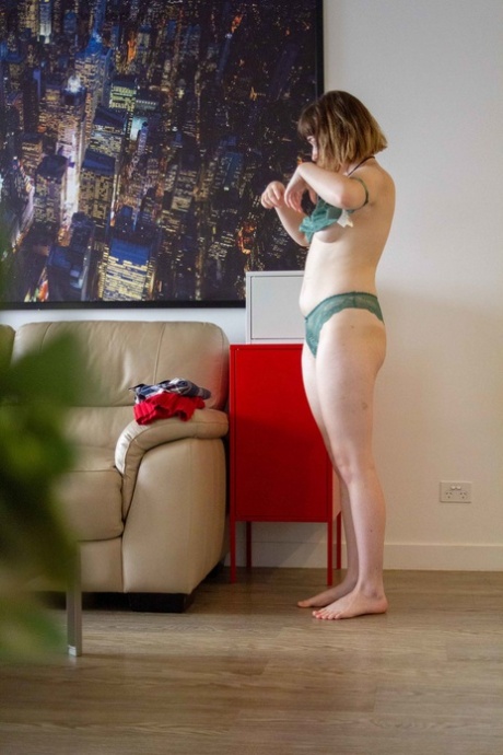 Displaying her stunning nude body while getting dressed, Casey Q is a beginner babe.