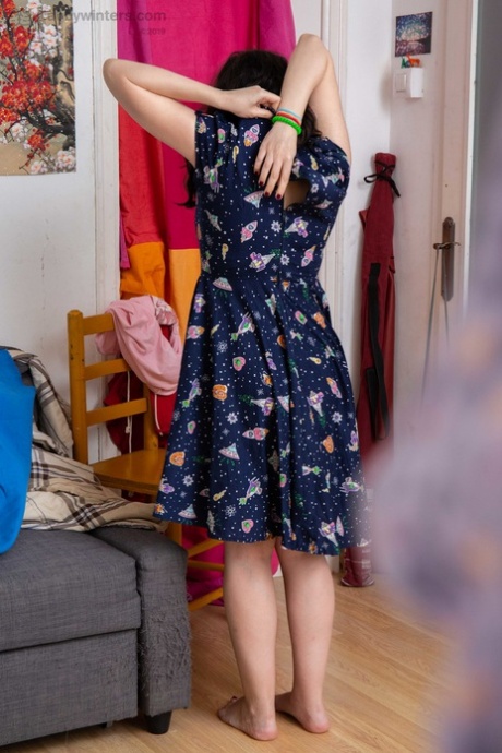 In her non-sequituristic state, Irene A from Australia wears pink panties and a summer dress to flatter her natural curves.