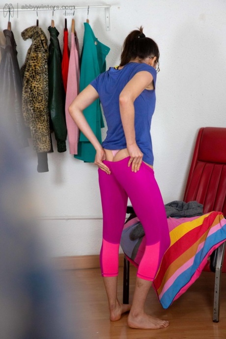 A cute and athletic Paola G is dressed in jogging shoes.