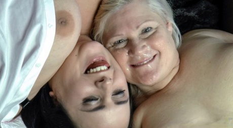 Lacey Starr, the horny grandmother, and her wife sharing an enormous black bird.