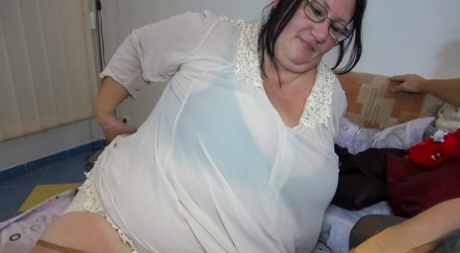 A picture shows BBW's grannies in nylons, Karen and Vera, licking and playing with each other.