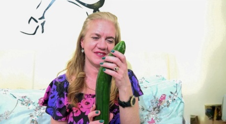 Kinky Granny Lily May Masturbates Her Horny Pussy With A Massive Cucumber