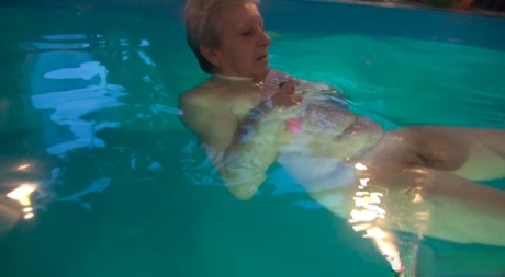 Horny Granny Jitka Masturbating In The Pool During A Nude Swim Session