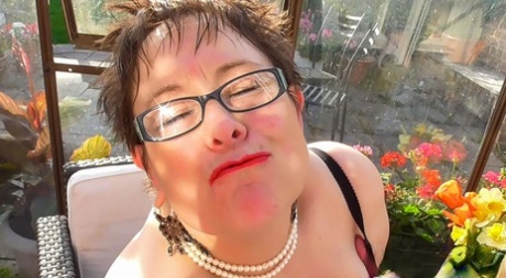 Short Haired BBW In Glasses Rita Shows Her Huge Breasts And Masturbates