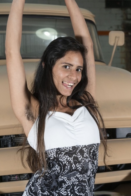 Exquisite American girl: Pamela stripping and showing off her hairy armpits.