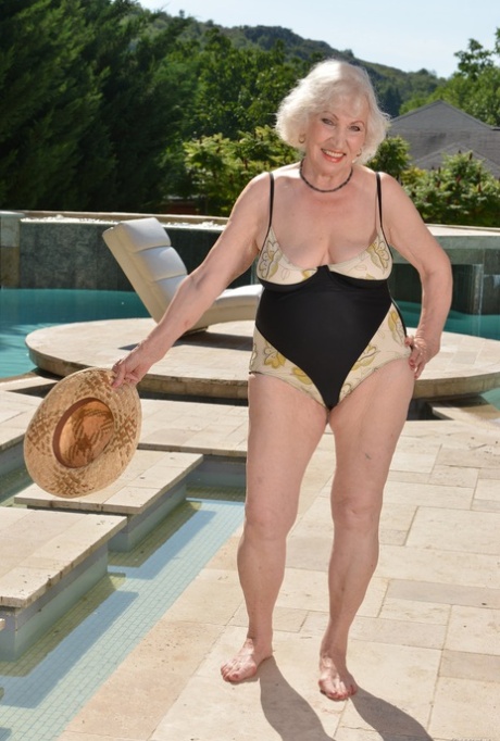 Grey Haired Granny Norma B Blows A Dong Before Taking It In Her Cunt Poolside