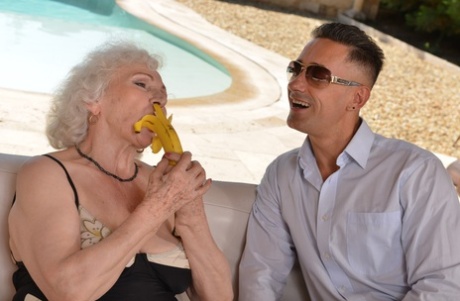 Grey Haired Granny Norma B Blows A Dong Before Taking It In Her Cunt Poolside