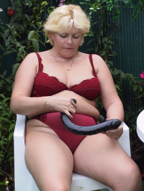 Blonde BBW Andrea Strips In The Garden & Fucks Her Love Hole With A Giant Toy