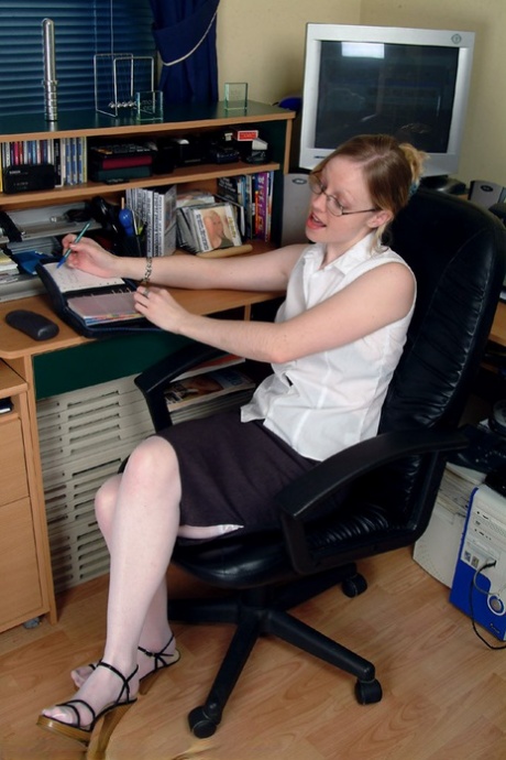 Horny British Secretary Claire J Toys With Her Dildo In The Office