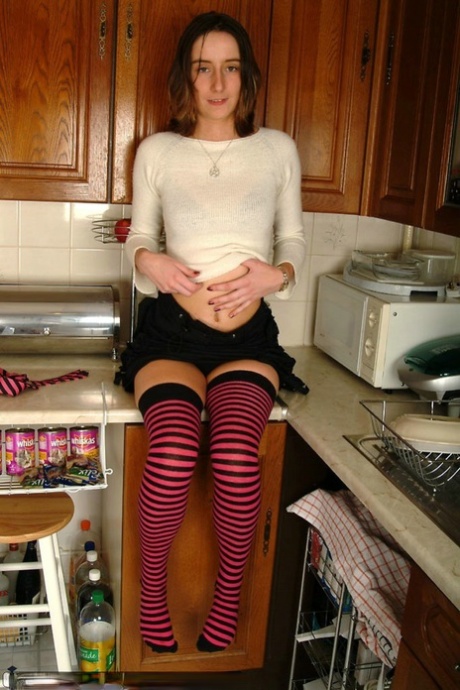 Young British Housewife Gina Strips In Front Of Her Man In The Kitchen